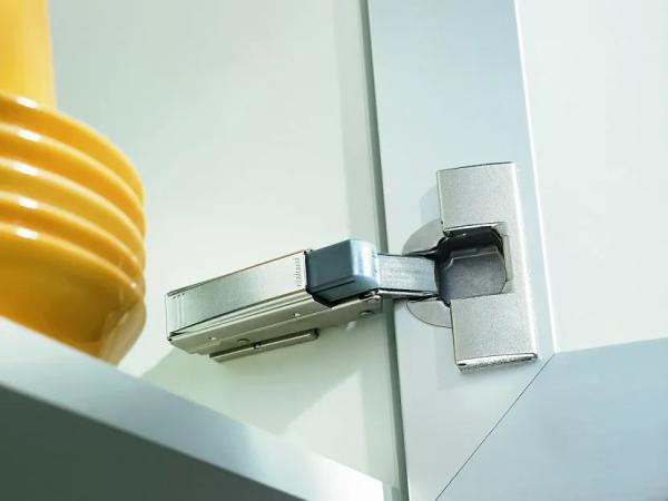 Доводчики для кухонных шкафов: залог долговечной эксплуатации мебели